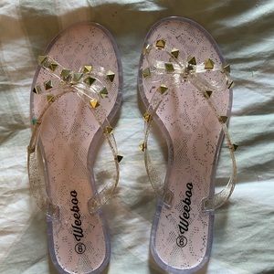 NWOT Jelly bow stud flip flops